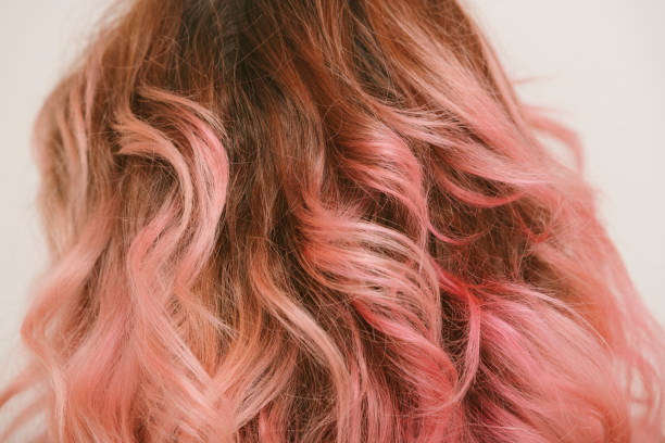 pink painted wavy hai pink painted wavy hair detail pink hair stock pictures, royalty-free photos & images