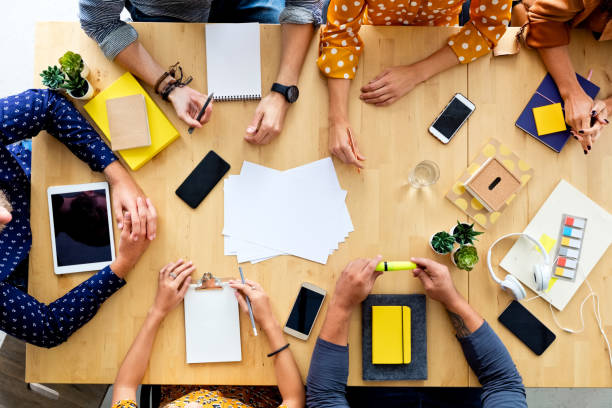 istock High angle view of business people at the table 1341633319