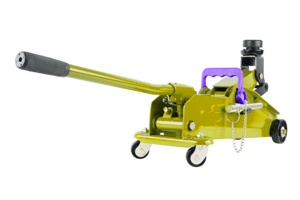 istock yellow hydraulic car jack isolated on white background, lifted up 1341633424