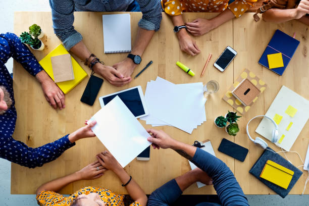 istock High angle view of business people at the table 1341633564