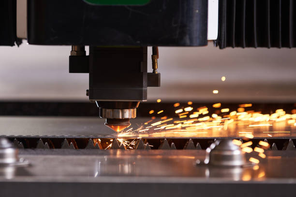 cnc laser cutting of metal, modern industrial technology. - cnc laser cutting imagens e fotografias de stock