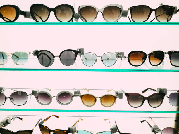 istock Modern fashionable sunglasses on display in store 1341637724