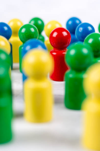 istock Game characters concepts - One figure stands apart from the group 1341638640