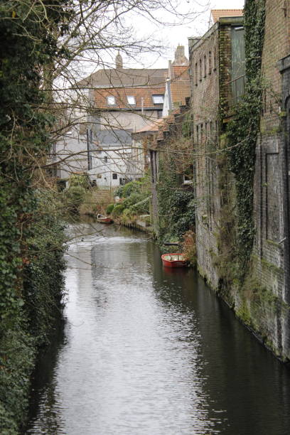 istock a red boat in Reine River in Brugge 1341638746