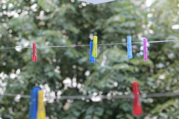 istock Colored clothespins on the clothesline 1341638879
