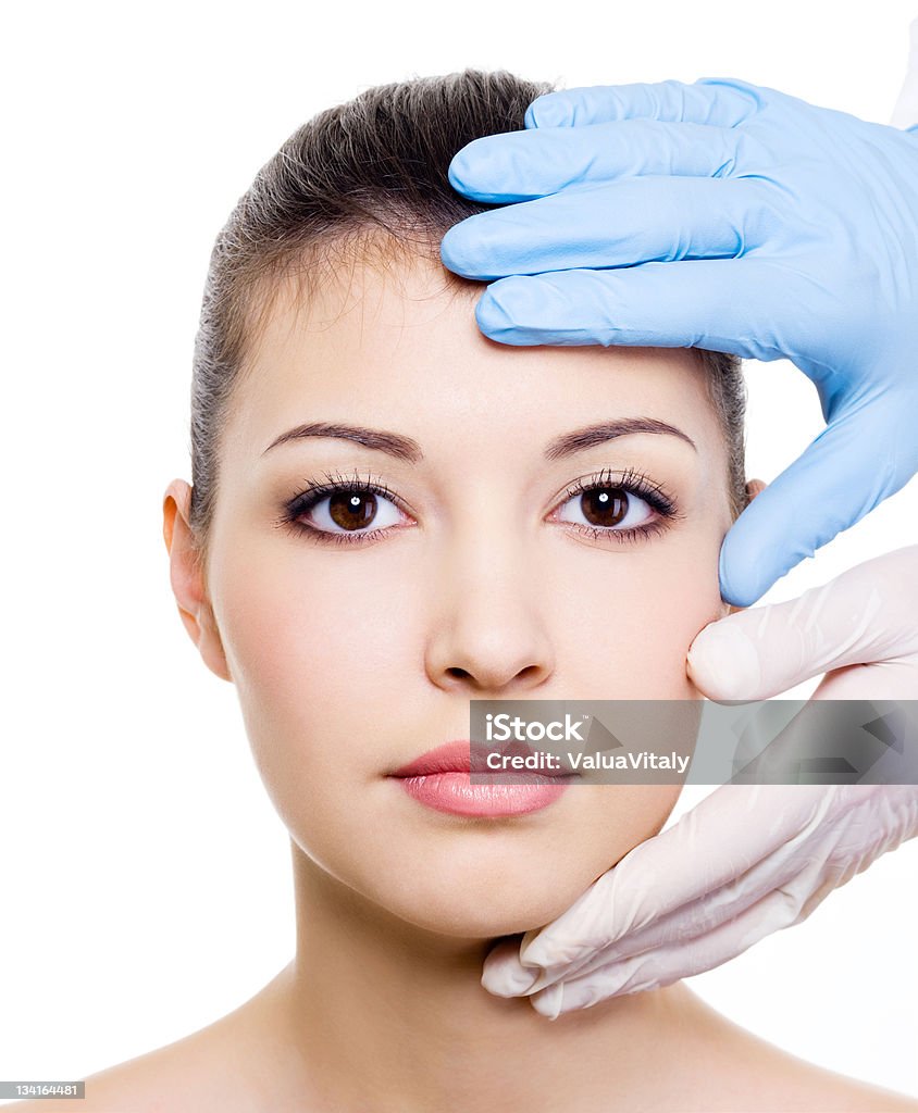 Beauty treatment of woman face Beauty treatment of the beautiful woman face - on a white background Adult Stock Photo