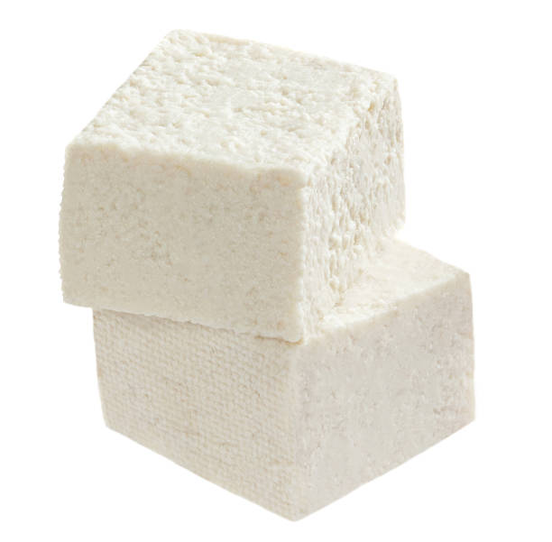 istock Feta cheese isolated on white background. Greek soft salty cheese 1341645617