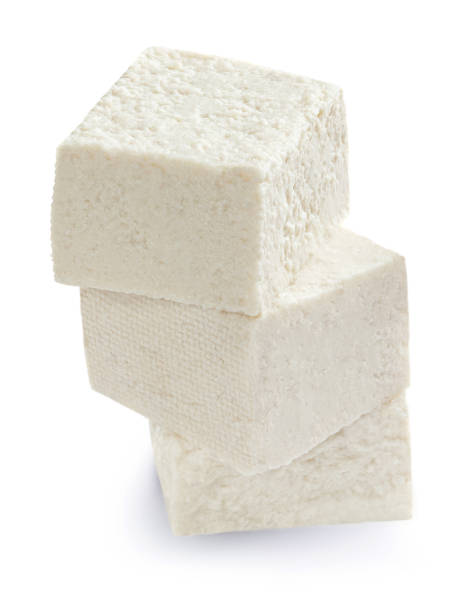 istock Feta cheese isolated on white background. Greek soft salty cheese 1341645623