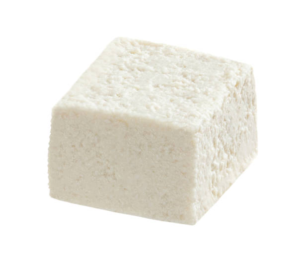 istock Feta cheese isolated on white background. Greek soft salty cheese 1341645641