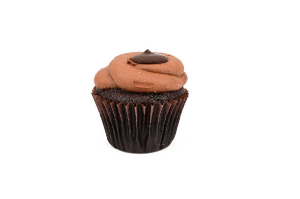 istock Chocolate cupcake with creme brulee on top and chocolate candy. 1341646062