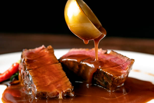 istock Grilled beef Steak filet Mignon medium rare for demi-glace sauce 1341649889