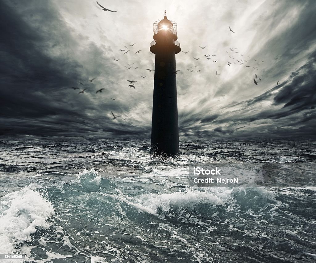 Stormy sky over flooded lighthouse Accidents and Disasters Stock Photo