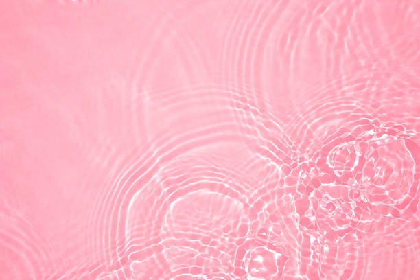 istock pink transparent clear water surface texture summer background 1341655377