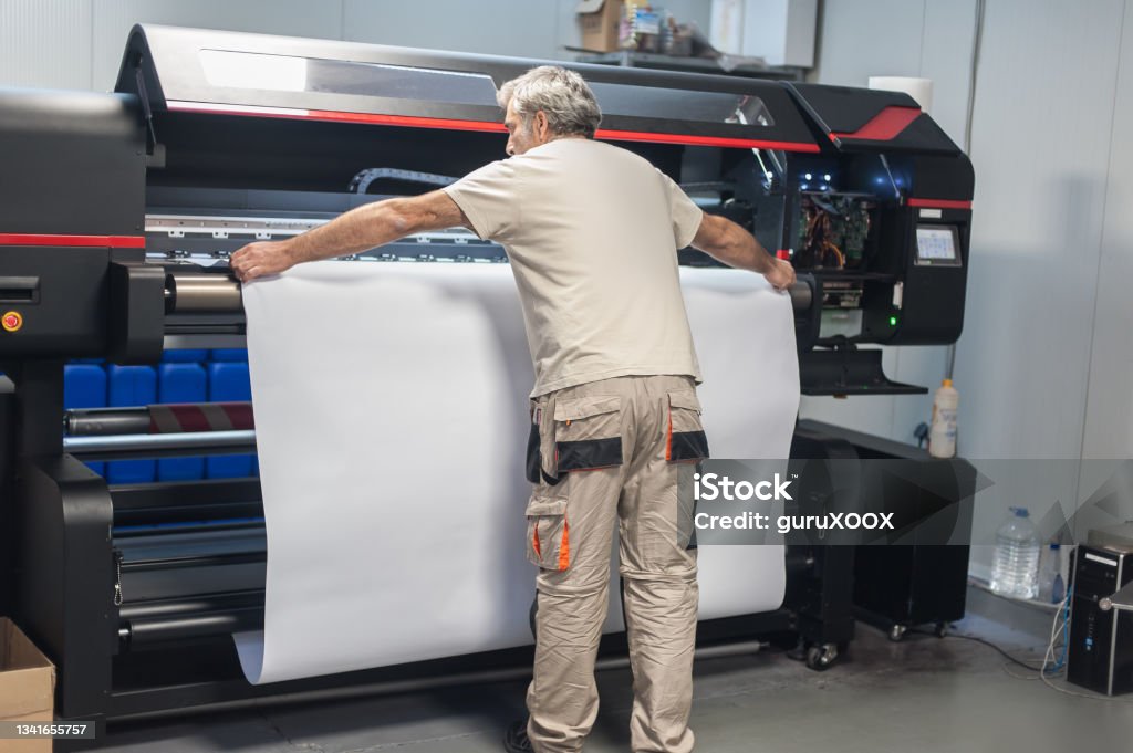 Plot Machine Operate Technician Operator Works On Large Premium Industrial Printer Plotter ...