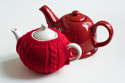 Red teapot and red sweater cozy teapot