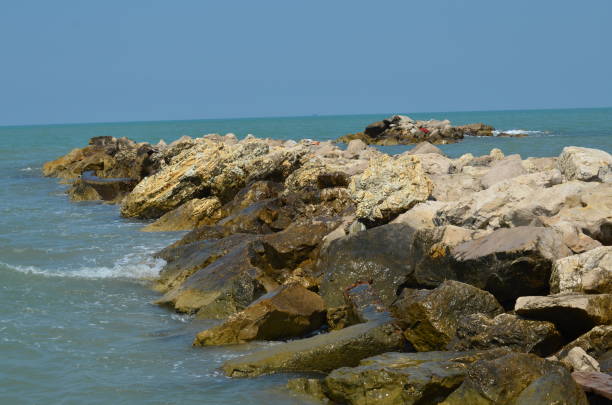 istock Light color rocks, stones - Sea Coast - granit 1341658406