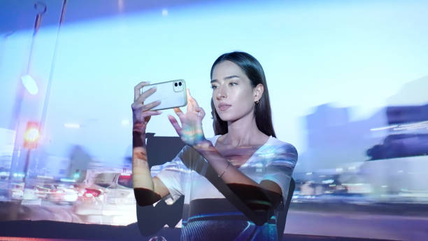 istock Image projection on a woman using a smart phone 1341660838