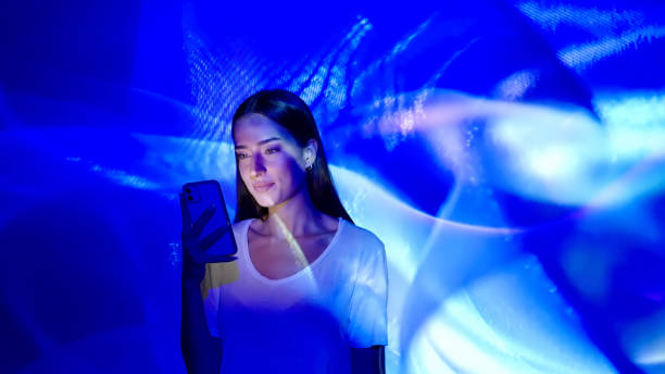 istock Image projection on a woman using a smart phone 1341661062