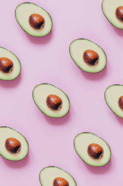 istock top view of cut avocado on pink background 1341662640