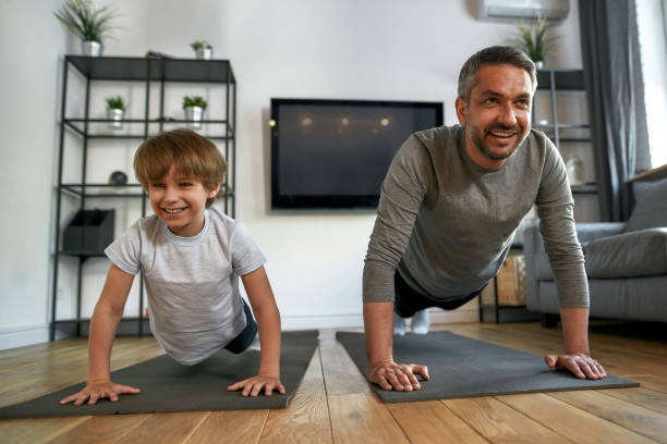 Active Dad 1,400+ Male Teenager Home Exercise Stock Photos, Pictures & Royalty ...