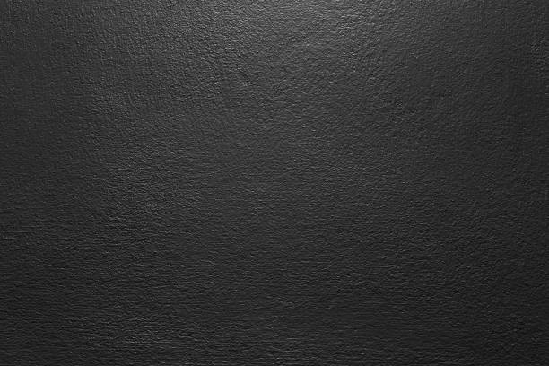 istock Dark black color old grunge wall concrete texture as background. 1341664438