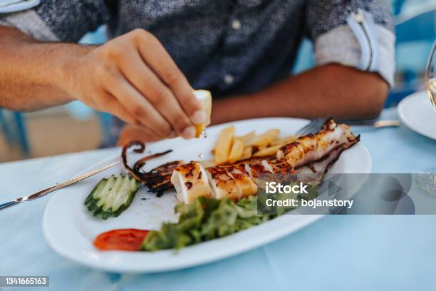 The Secret Is In The Spices Stock Photo - Download Image Now - Fish, Plate, Eating