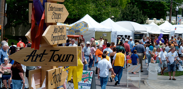 Springfield, MO, USA-May 7, 2005: Historic Walnut Street in downtown Springfield, Missouri is converted into a pedestrian mall for two days in the late spring during the annual Artsfest. According to organizers, the event draws about 20,000 visitor from the area to peruse artists' vendor tents who have come from across the country to sell their creations.