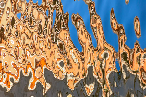 bright reflection in the waves of water in harmonic pattern