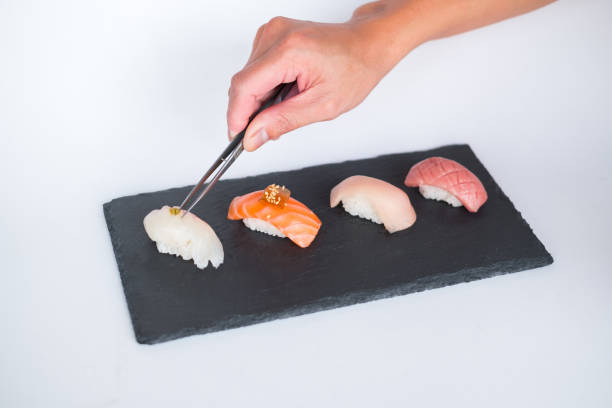 istock Sushi Nigiri served on black tray. 1341674387