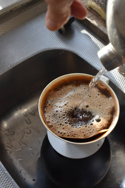 istock The morning coffee is beeing made - frothy drink. 1341675413