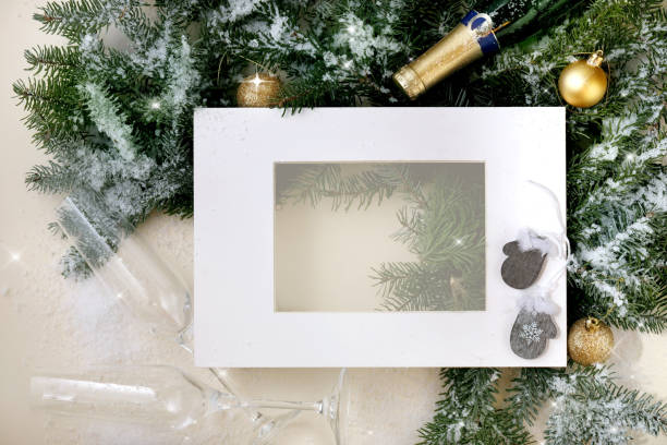istock Christmas greeting card with fir tree in white frame 1341679425