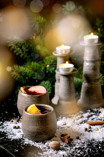 istock Hot mulled wine with spices and Christmas decorations 1341679460
