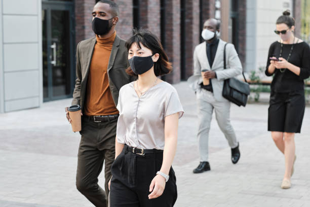 istock Business People Wearing Masks 1341682815