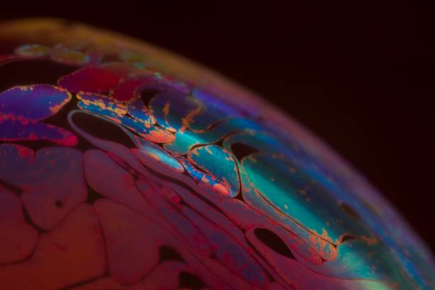istock green,blue and red bubbles from water and acid 1341683590