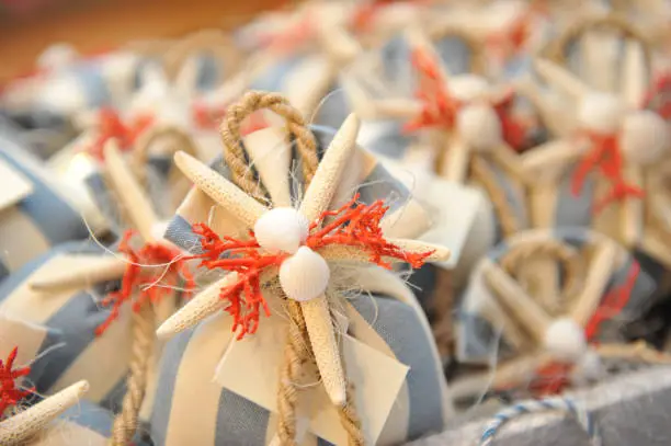 Wedding table with favors and confetti.