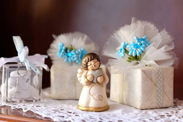 Wedding table with favors and confetti.