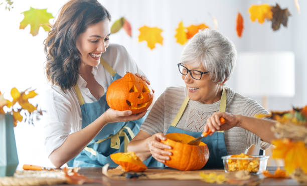 istock family preparing for Halloween 1341686659