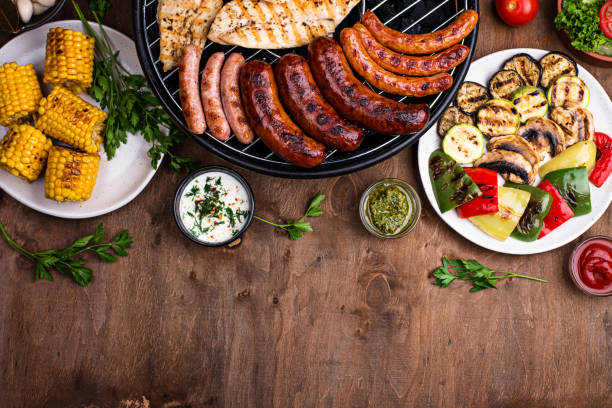 istock Grilled sausages, meat, and vegetables. 1341690142