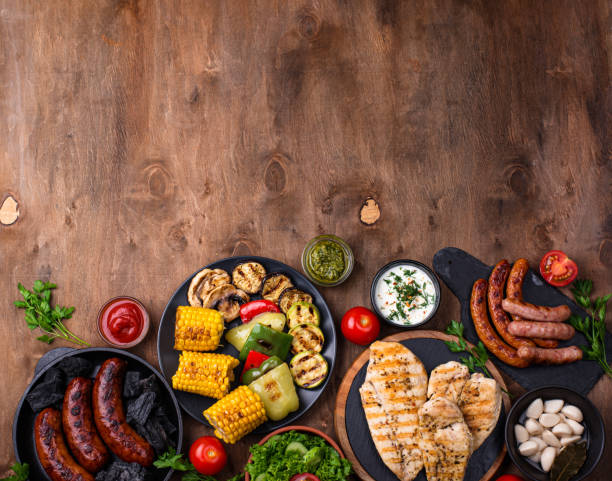 istock Grilled sausages, meat, and vegetables. 1341690145