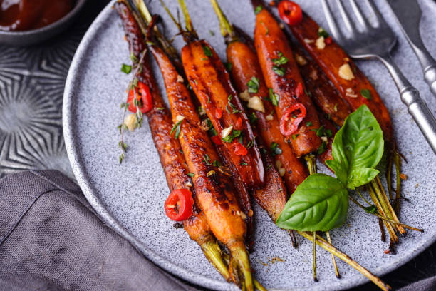 istock Baked carrot glazed with soy sauce and honey 1341690224