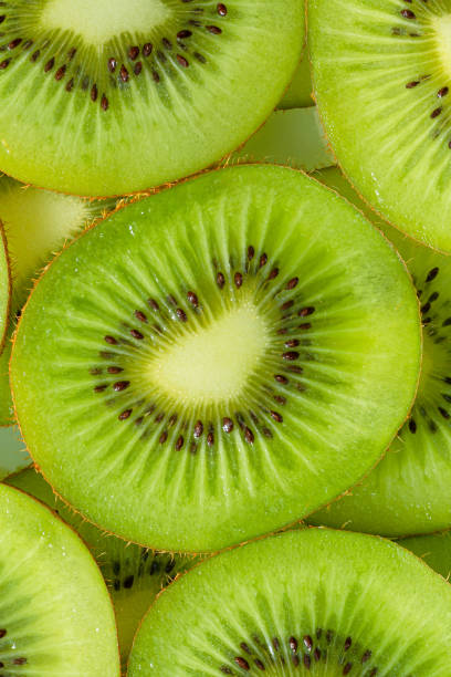 istock Kiwi Macro,Kiwi fruit pattern. Healthy food background, overhead. 1341691641