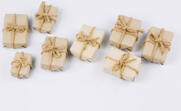 istock brown gift on a white background,Stack of handcraft gift boxes on white background 1341691664