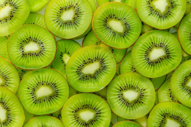 istock Kiwi Macro,Kiwi fruit pattern. Healthy food background, overhead. 1341691670