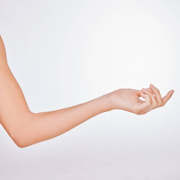 istock Studio shot of an unrecognisable woman’s beautiful hands against a grey background 1341693609