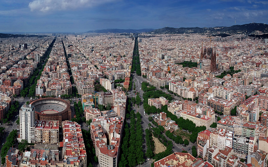 Barcelona city general aerial panoramic photo by drone, Sagrada Familia Basilica and Diagonal district panorama from the air.