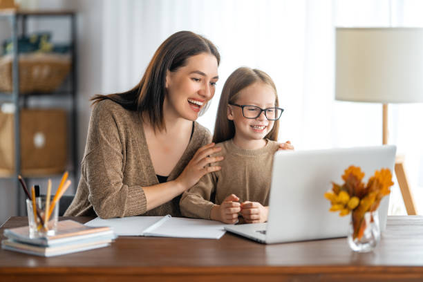 istock Girl doing homework or online education. 1341695974