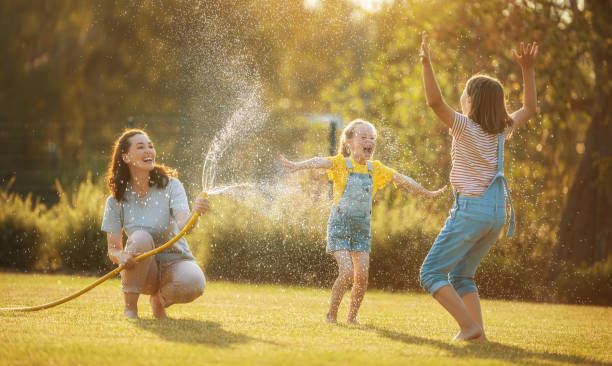 istock Happy family playing in backyard 1341699229