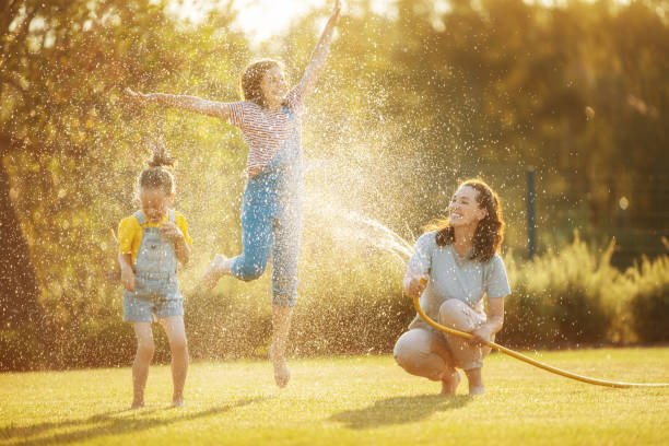 istock Happy family playing in backyard 1341699268