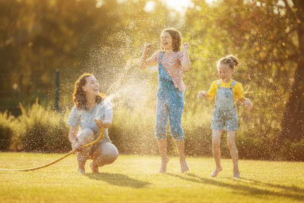 istock Happy family playing in backyard 1341699276