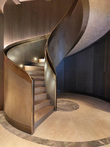 istock Curving staircase in modern home interior 1341704518